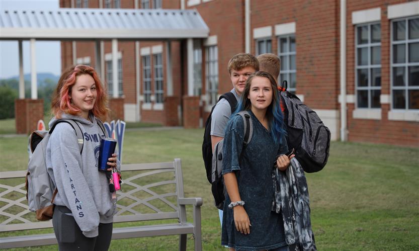 Students stand outside of Summit High School